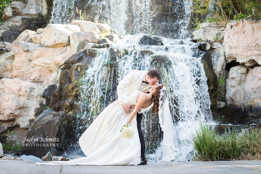 romantic kiss dip shot wedding